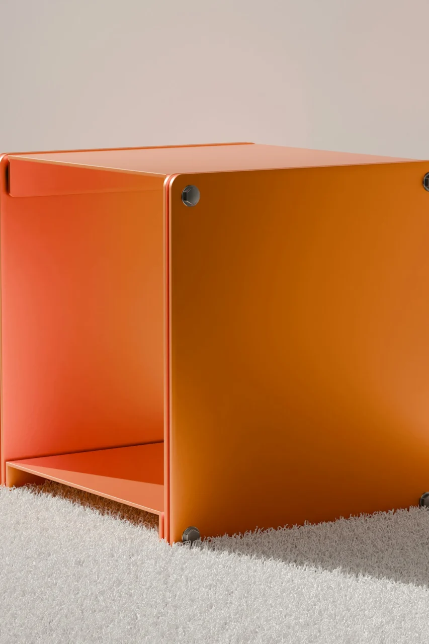 A bright orange cube-shaped shelf