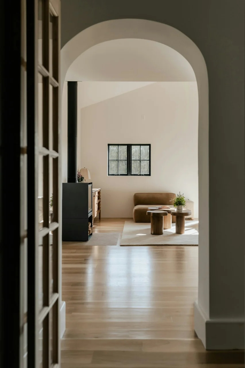 A hallway leading to a living room and dining room