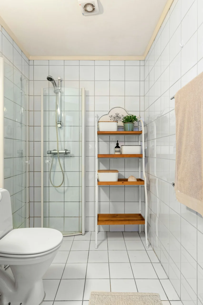 How to Organize a Small Bathroom Without Installing More Cabinets interior: 2. Make the Area Under the Sink Work Like a Pull‑Out Drawer - The space beneath a sink is often wasted because the plumbing intrudes into the usable volume. By placing a slim, pull‑out bin or a set of stackable trays that glide on small rollers, you transform