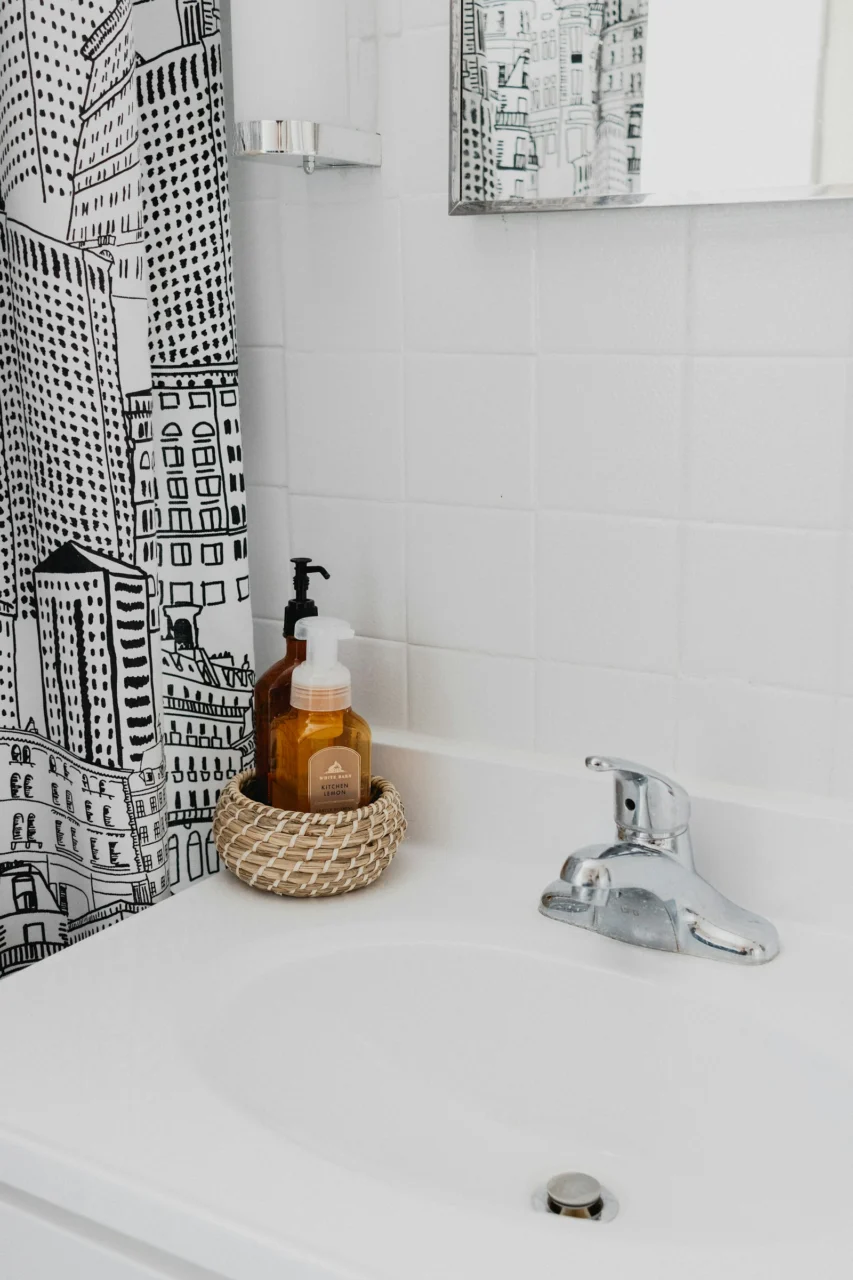 How to Organize a Small Bathroom Without Installing More Cabinets interior: 3. Add Magnetic Strips and Towel Bars for Quick‑Grab Items - Metal grooming tools—such as tweezers, nail clippers, and small scissors—can disappear into drawers, only to be found when you need them most. A thin magnetic strip mounted just above the vanity mirror provides a dedicated