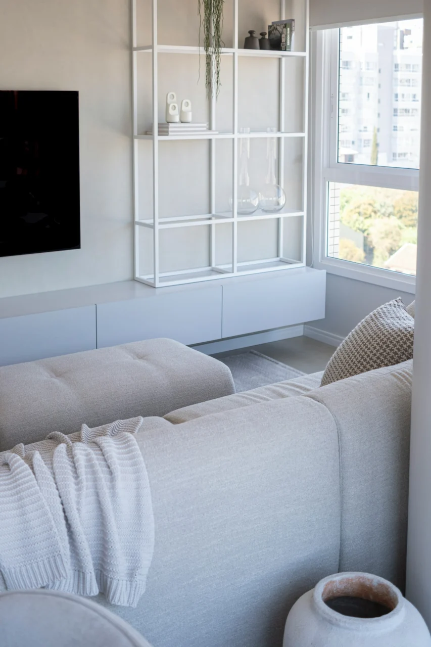 Living Room Storage Ideas That Don't Look Like Storage interior: 7. Mount a slim media console with hidden drawers - Media consoles often dominate a living‑room wall, but a low‑profile unit with concealed drawers can keep electronics tidy while preserving a clean silhouette. Select a piece finished in brushed walnut or matte black, with front